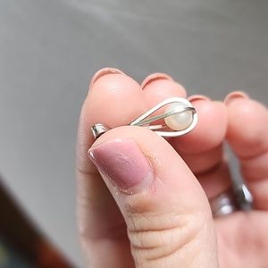 Cute baby pearl in sterling silver cage